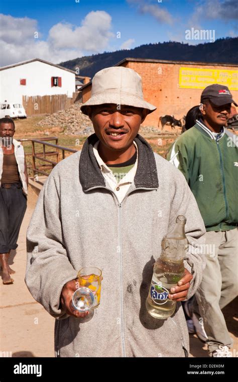 Madagascar Ambositra Savika Zebu Running Man With Bottle Of Local