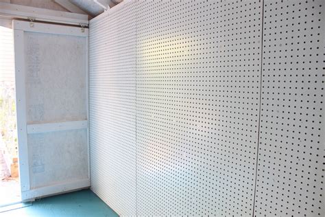 I really like these panels, far better than regular peg board. How to Install Pegboard Walls for more storage and ...