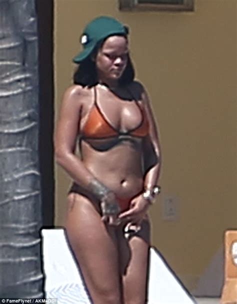 rihanna parades around in tiny two piece in mexico daily mail online
