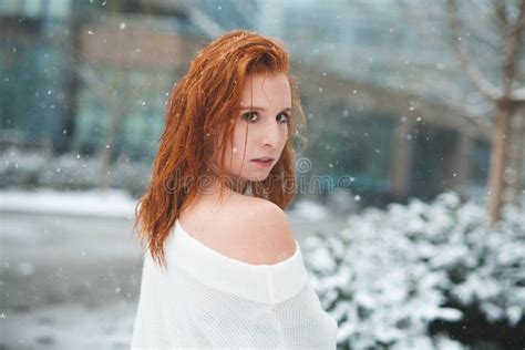 Redhead In The Snow Looking Into The Camera Stock Image Image Of