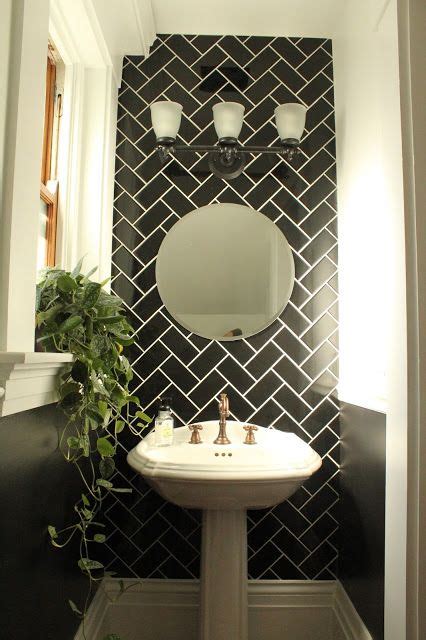 Herringbone and chevron are timeless when combined with beautifully crafted materials. modern garden | Bathroom accent wall, Powder room ...