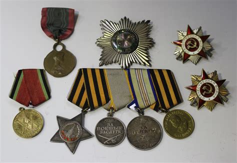 A Group Of Four Second World War Russian Medals Including The Order Of