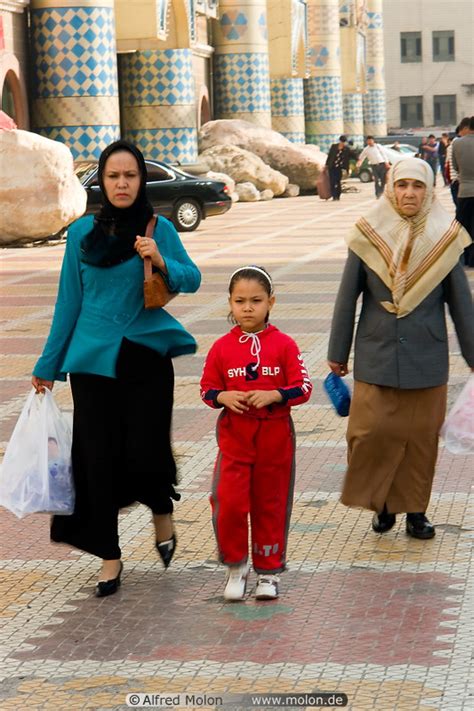 Photo Of Uighur Muslim Women With Headscarf And Small Girl People Urumqi Xinjiang China