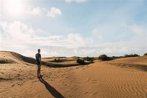 Man In The Dunes Desert In A Sunny Day Stock Photo Image Of Solitude