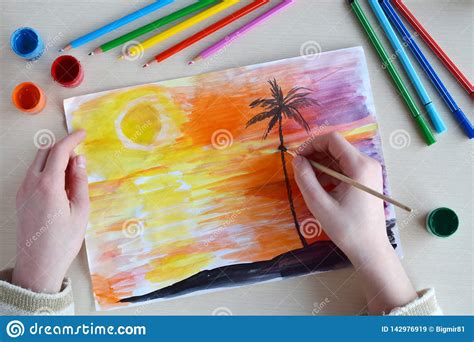 Children`s Drawing Sunset On The Island In The Sea Or Ocean And Palm