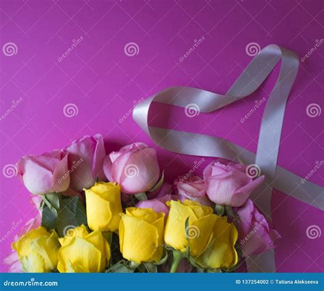 Pink And Yellow Roses And Grey Heart Shape Ribbon On Pink Background Stock Photo Image Of