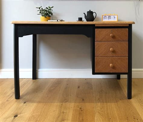 You get a generous work surface and a clever solution to keep cables in place bekant. SOLD *** Teachers Desk MCM Black and Oak- similar item now ...