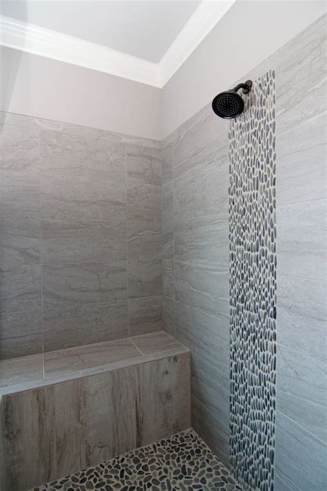 Gray Pebble Tile Waterfall In Shower Traditional Bathroom Raleigh