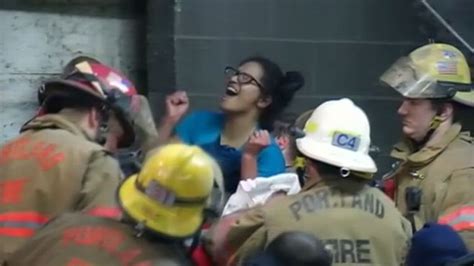 portland woman trapped between two buildings freed abc news