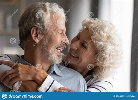Close Up Smiling Older Couple Hugging Enjoying Tender Moment Stock Image Image Of Marriage