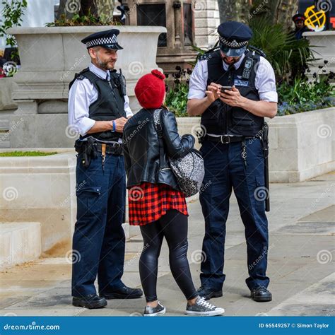 Police Helping A Pedestrian Editorial Photography Image Of