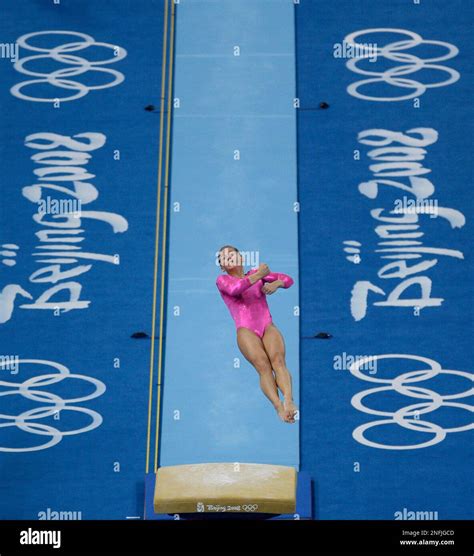 Us Gymnast Shawn Johnson Performs On The Vault During A Podium