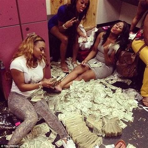 Strippers Pose For Photos With Piles Of Dollar Bills Daily Mail Online