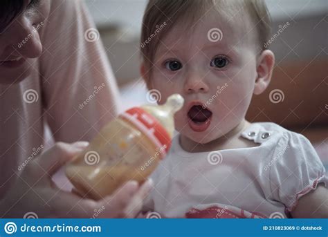 Little Baby Drinking Juice From Bottle Stock Image Image Of Mother