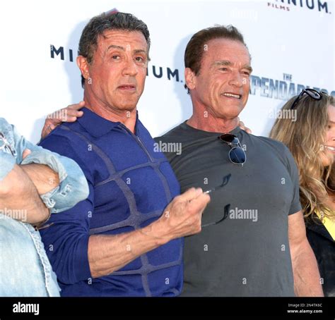 Sylvester Stallone And Arnold Schwarzenegger During A Photo Call For