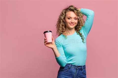 Beautiful Young Woman With Curl Hair Posing On Pink Background With