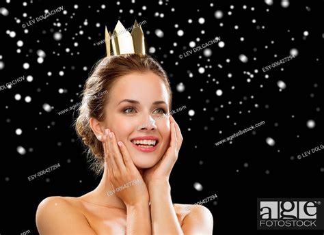People Holidays Royalty And Glamour Concept Smiling Woman In Evening Dress Wearing Golden