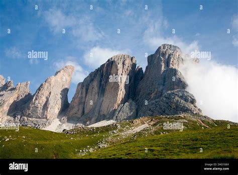 Mist Swirling Around The Cliffs Of The Langkofel Viewed From The