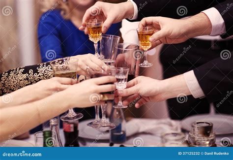 Group Of People Toasting At A Celebration Stock Photo Image Of