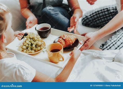 Happy Child Bringing Breakfast To Parents In Bed Stock Photo Image Of