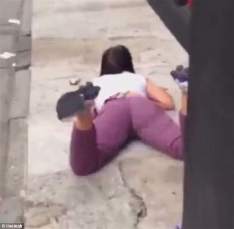 woman caught twerking against the ground daily mail online