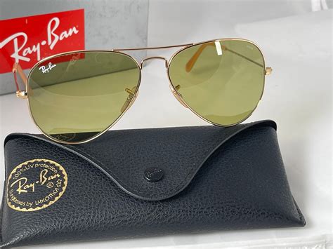 ray ban aviator evolve 99 these have photochromic lenses that darken when you walk outside into