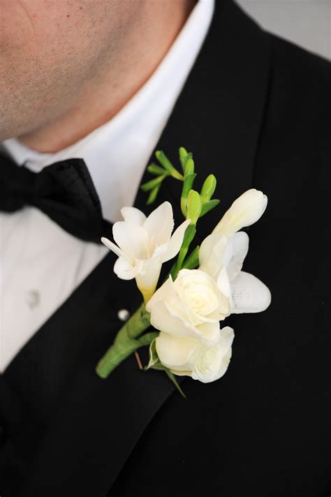 Simple White Rose And Freesia Boutonniere White Spray Roses White