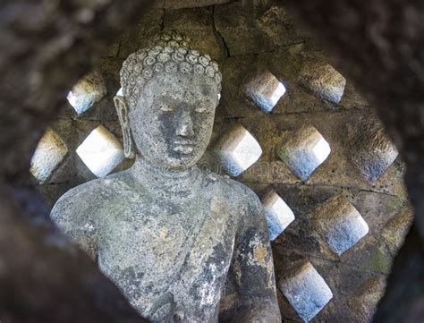 A Close Up Buddha Statue Inside A Stupa In Borobudur Temple Indonesia