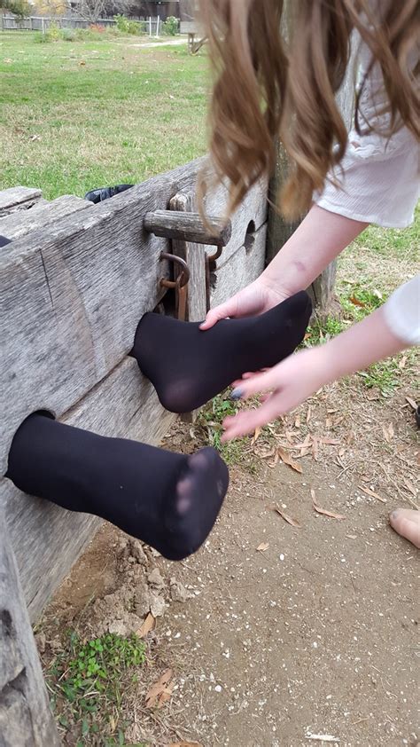 tickling feet in tights stocks pillory a girl wearing bl… flickr
