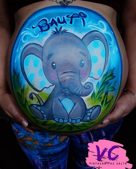 A Pregnant Belly With An Elephant Painted On It