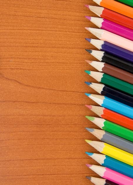 Premium Photo Colorful Pencils On Wood Texture