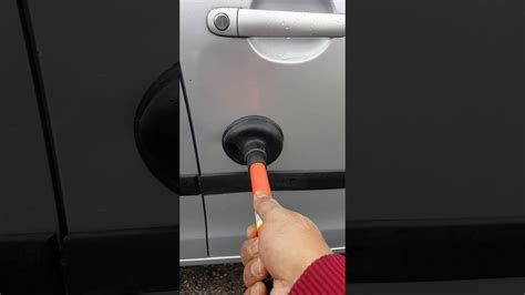 How To Remove A Dent On Car Door With A Plunger Youtube