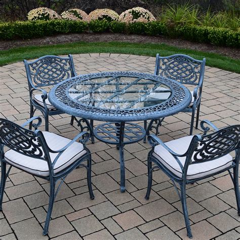 What are the shipping options for round patio dining tables? Oakland Living Mississippi Cast Aluminum 5 Piece Patio ...