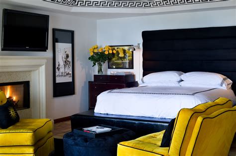 For a black and white bedroom, designer casey sarkin introduced two colorful abstracts, proving that color can comingle without disrupting a black and white room's core identity. Black,White And Yellow Bedroom Ideas