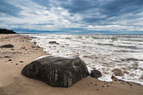 Stones On Shore Of The Baltic Sea Stock Photo Image Of Blue Clouds