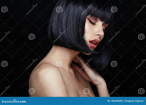Profile Of A Sensual Model In Black Wig Closed Eyes Touches His Neck Naked Shoulders