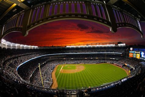 The new york yankees are an american professional baseball team based in the new york city borough of the bronx. Sunset at Yankee stadium. | Mlb stadiums, Yankee stadium ...