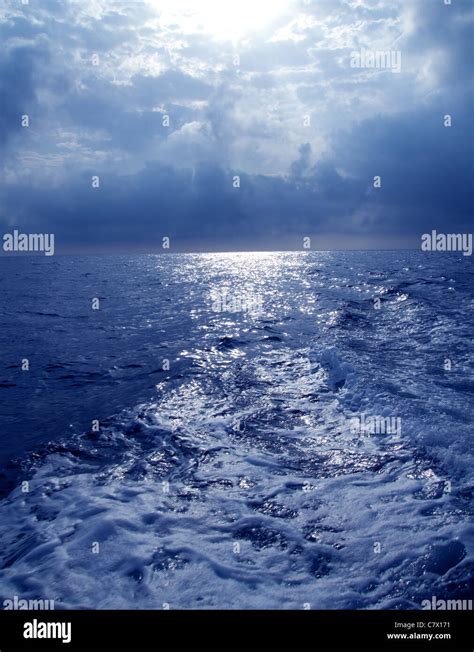 Blue Sea In Stormy Dramatic Sky Day With Boat Wake Stock Photo Alamy