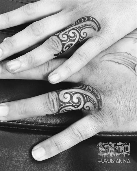 Image May Contain One Or More People Ring And Closeup Maori Tattoo