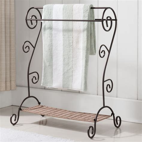 The elegant free standing style takes advantage of unused corners or awkward spaces; InRoom Designs Free Standing Towel Rack | Wayfair