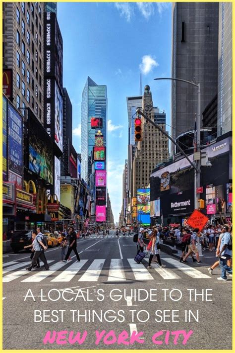 A Pinterst Pin Image Of A Street Level Shot Of Times Square With The