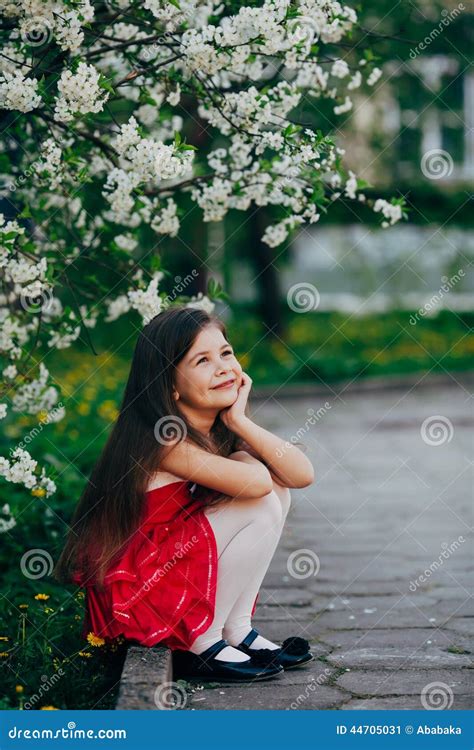 Pretty Girl Sitting Under The Cherry Tree Stock Image Image Of