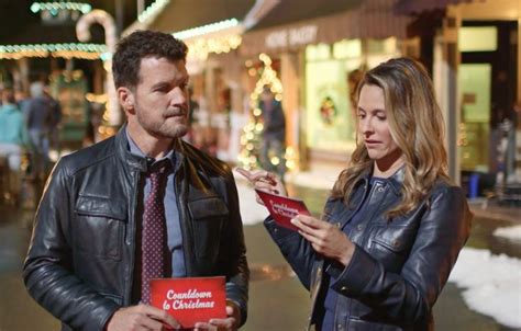 Stars Jill Wagner And Mark Deklin Have A Good Chuckle With Holiday