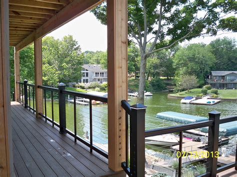 Deck railing systems consist of components like a top rail, bottom rail, post caps, & infills so you can customize the elements. Black Timbertech Radiance Express railing components with Feeney stainless steel cables ...