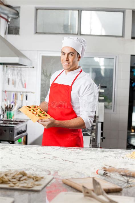 Male Chef Holding Tray With Stuffed Ravioli Pasta Stock Photo Image