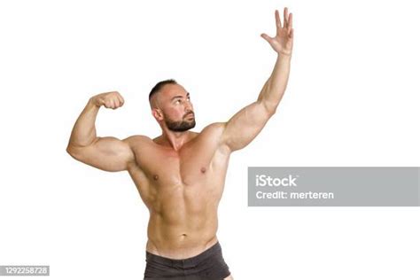 Muscular Man Flexing Bicep Muscle Stock Photo Download Image Now