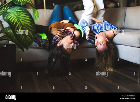 Two Womans Sitting On The Couch Take Some Good Time At Home Stock Photo Alamy