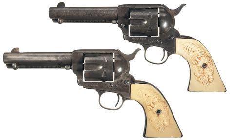 Two Antique Colt Single Action Army Revolvers With Belt