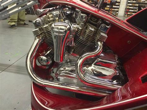 A Red Motorcycle Engine Is Shown In This Image