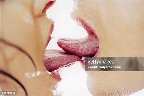 Spit Kiss Photos And Premium High Res Pictures Getty Images